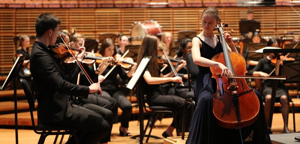 cellist-solo-performing-with-orchestra