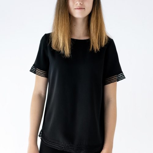 girl wearing black top and black pants