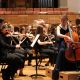 cellist-solo-performing-with-orchestra