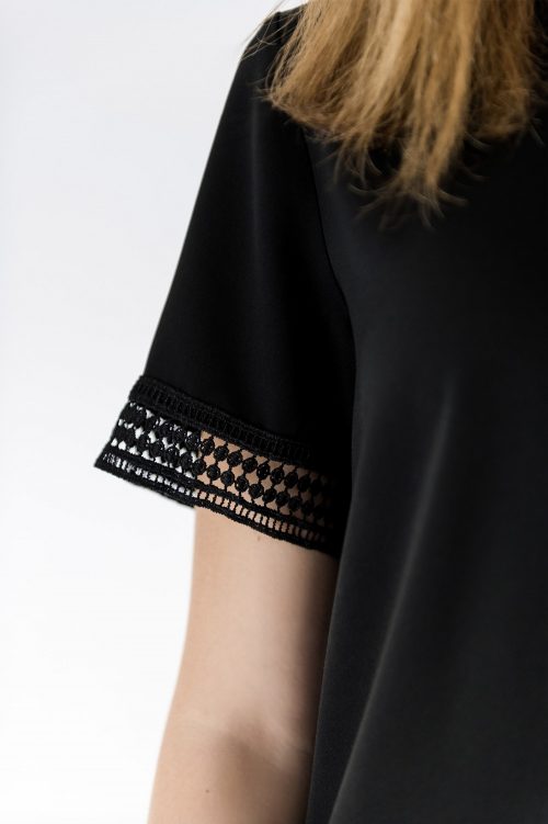close up of lace detail on sleeve